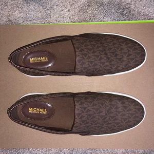 Brown Michael Kors slip ons